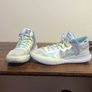 Used kyrie irving shoes very slight rip on left shoe shown in last picture.